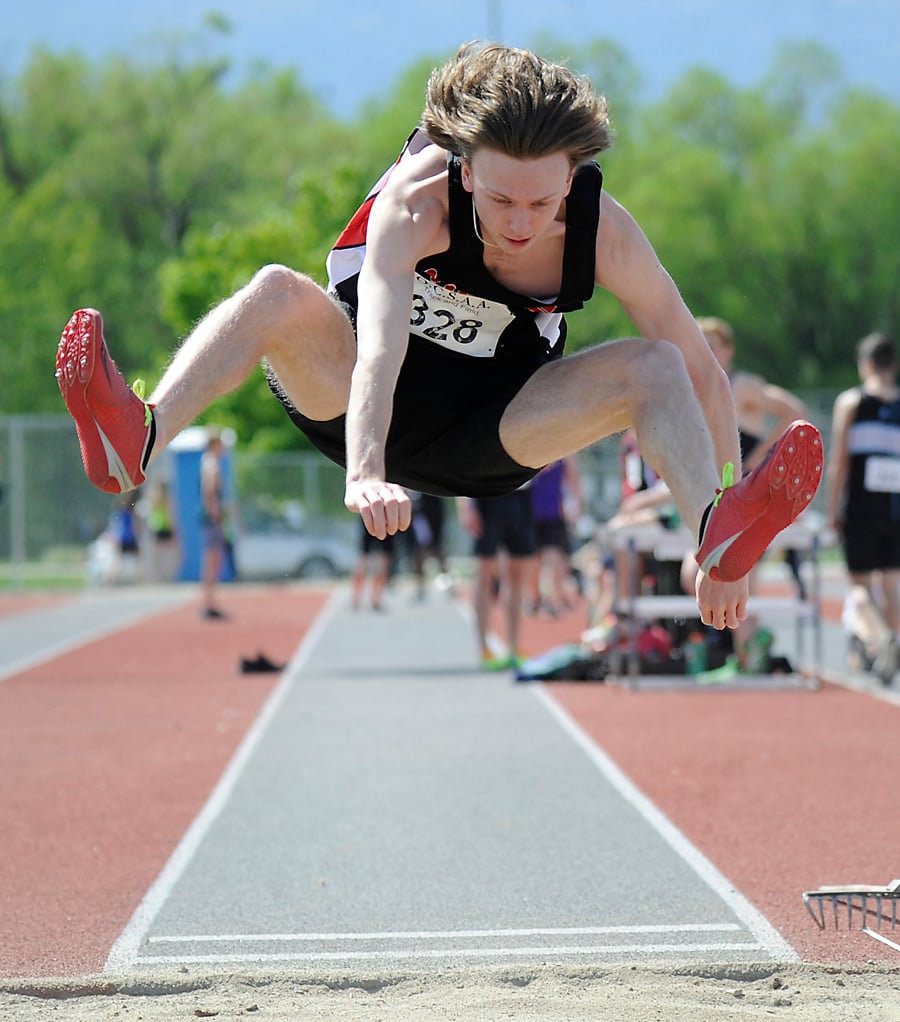 <who>Photo Credit: Lorne White/KelownaNow </who>Mitchell Steven of the Mt. Boucherie Bears gets plenty of air in the senior long jump event.