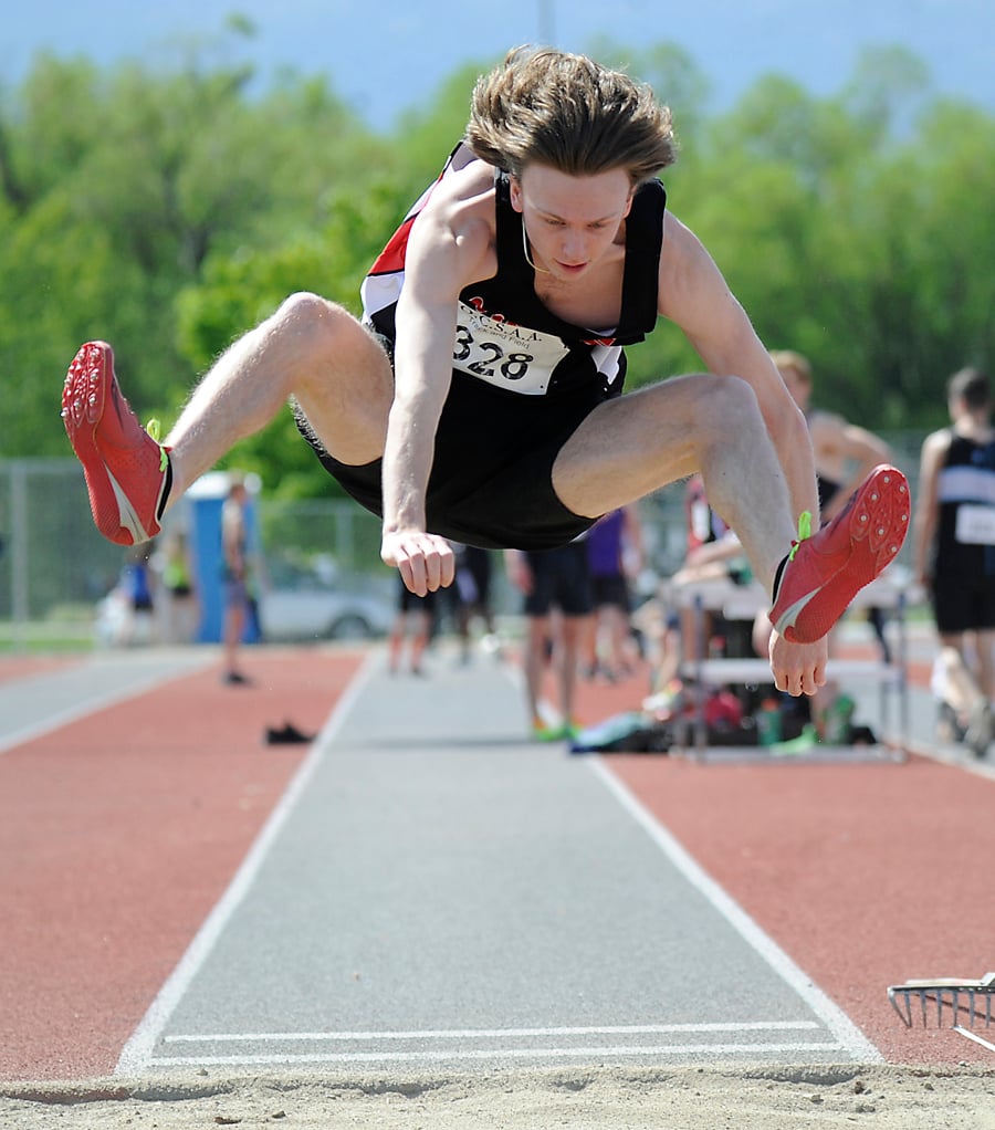 Mitchell Steven of the Mt. Boucherie Bears gets plenty of air in the senior long jump event.