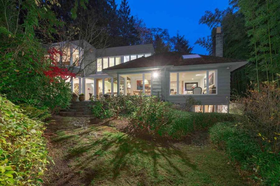 The house is nestled away within its own little mini forest.