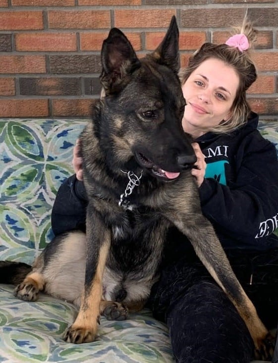 <who>Photo Credit: RCMP</who>Chelsea Cardno and her German sherpherd JJ.