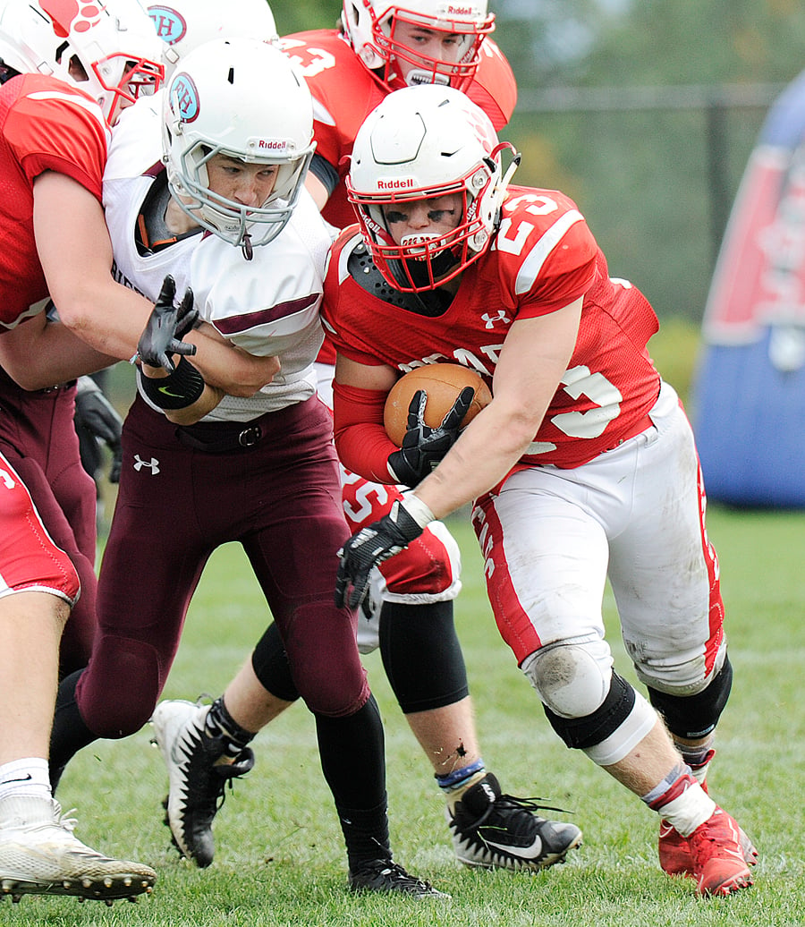 <who>Photo Credit: Lorne White/KelownaNow </who>Grade 10 Aidan Wiberg of the Bears turns the corner on the way to another solid run against Eric Hamber. He carried the ball 30 times for 147 yards and a pair of touchdowns.