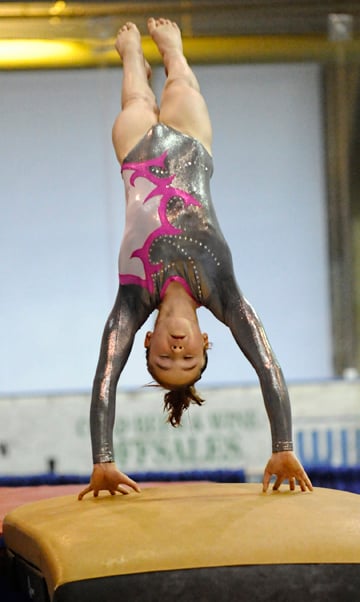 <who>Photo Credit: Lorne White/KelownaNow </who>Samantha Pelletier of the OGC finished third on vault and uneven <br>bars in the Aspire 2 competition.