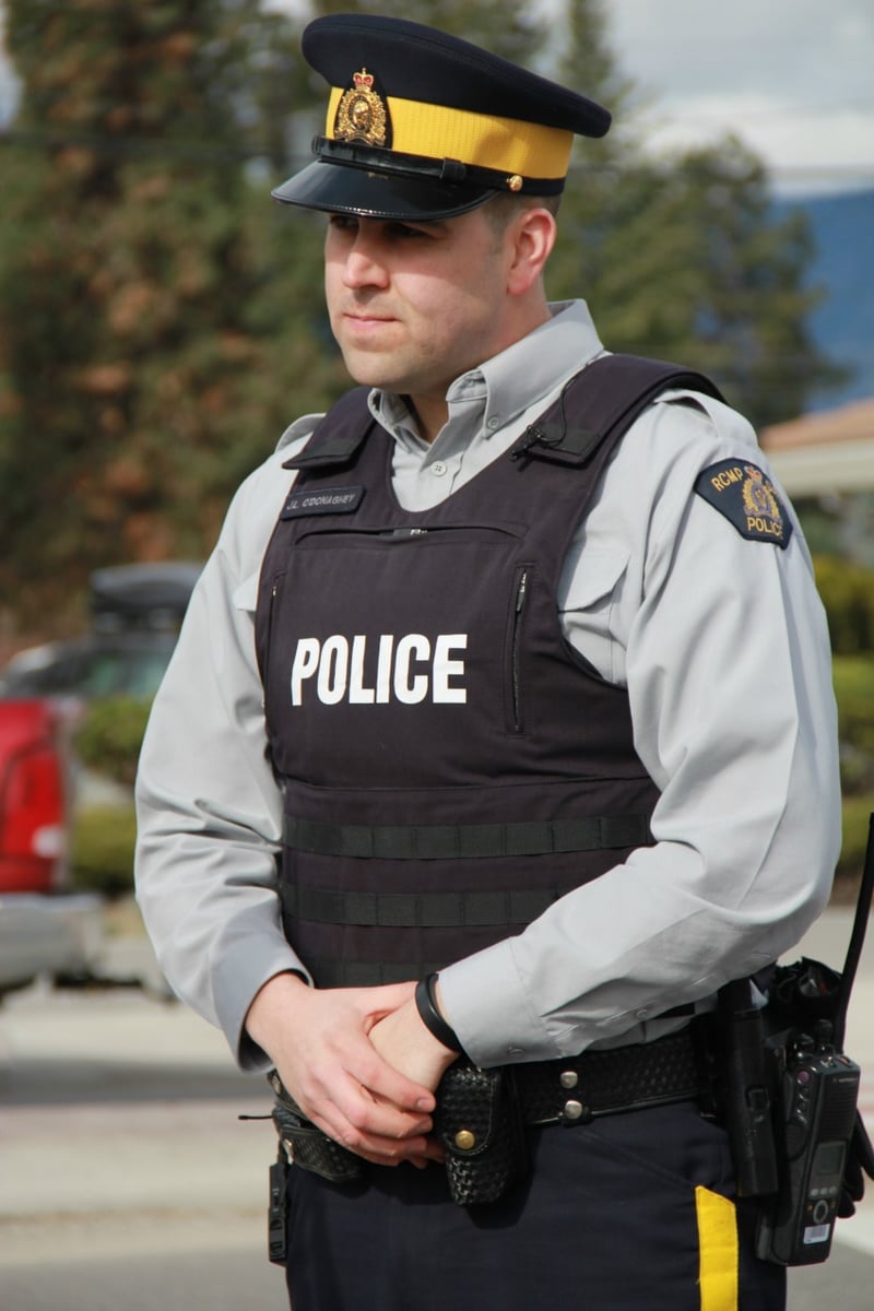 <who> Photo Credit: KelownaNow.com </who> Cst. Jesse O'Donaghey was one of 150 officers sent to Alberta.