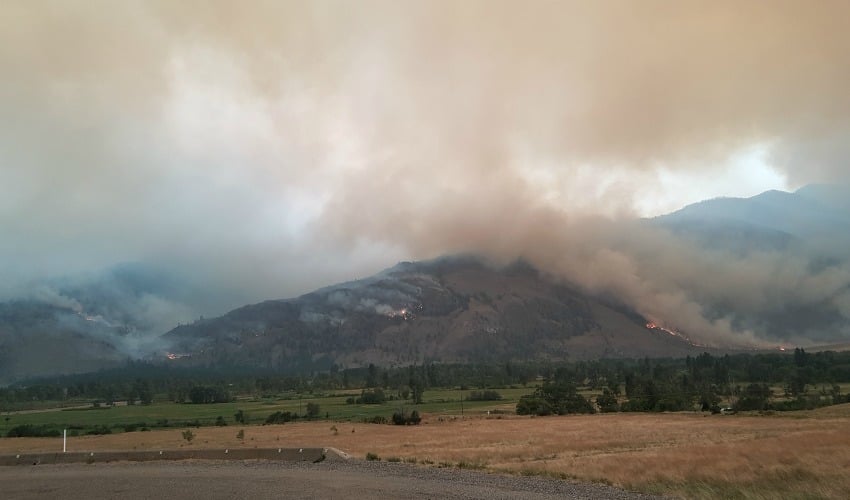 <who>Photo Credit: BC Wildfire Service</who>Photo taken of Snowy Mountain wildfire at 06:15 a.m., east flank south of Cawston.
