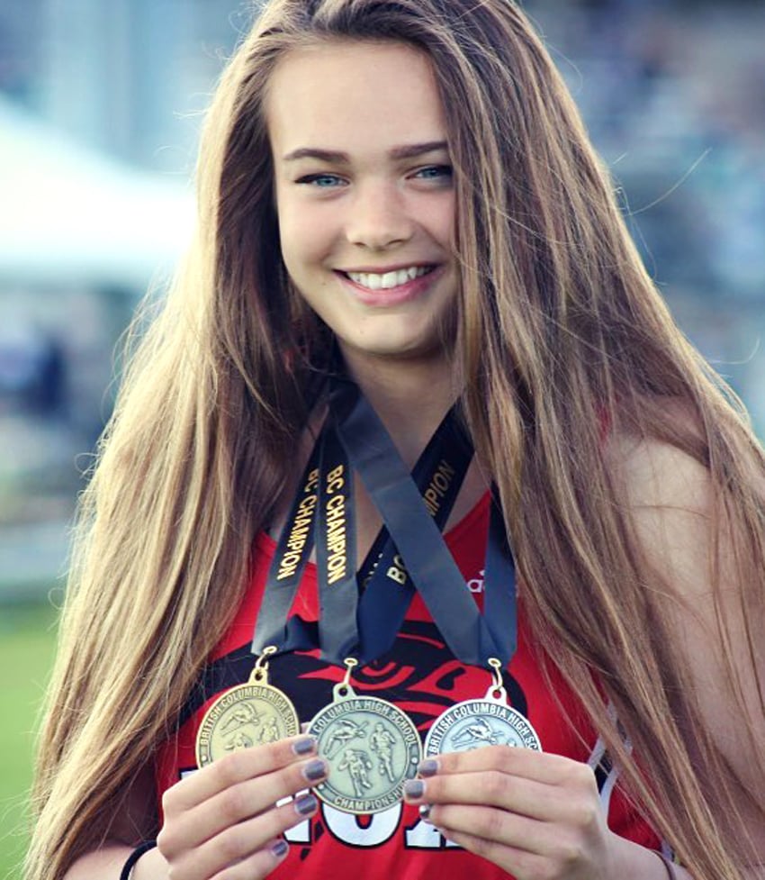 <who>Photo Credit: Farrah Cannan </who>Emma Cannan of Dr. Knox Middle School is all smiles after winning two gold and a silver at the B.C. High School Track and Field Championships in Langley on the weekend.