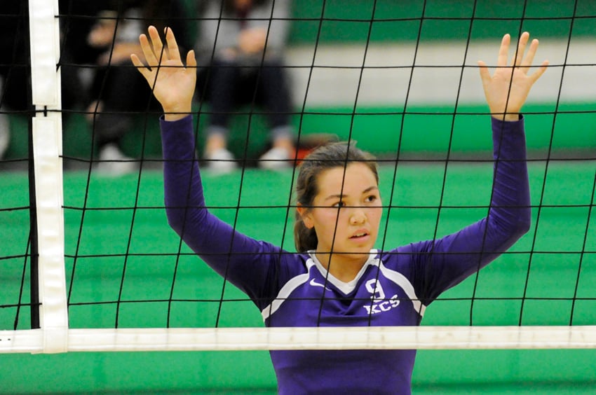 <who>Photo Credit: Lorne White/KelownaNow </who>The Knights' right side hitter, Julia Toews, gets set for a serve against G.W. Graham.