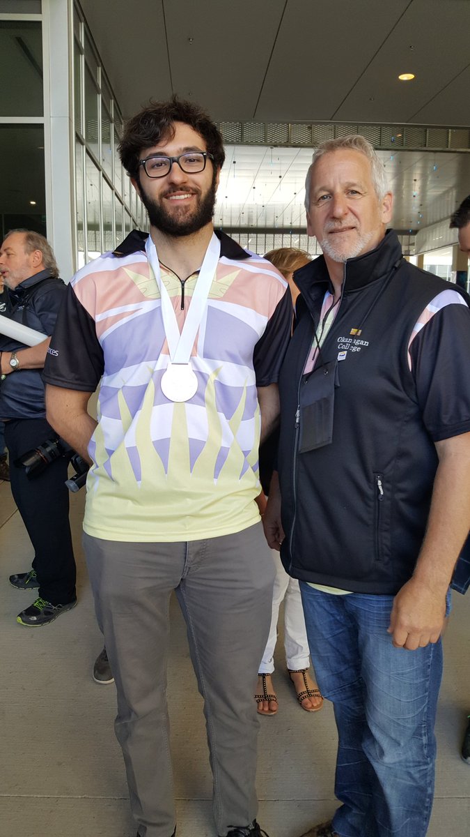 <who> Okanagan College </who> Brendan Battersby, pictured left, with his coach Ron Light 