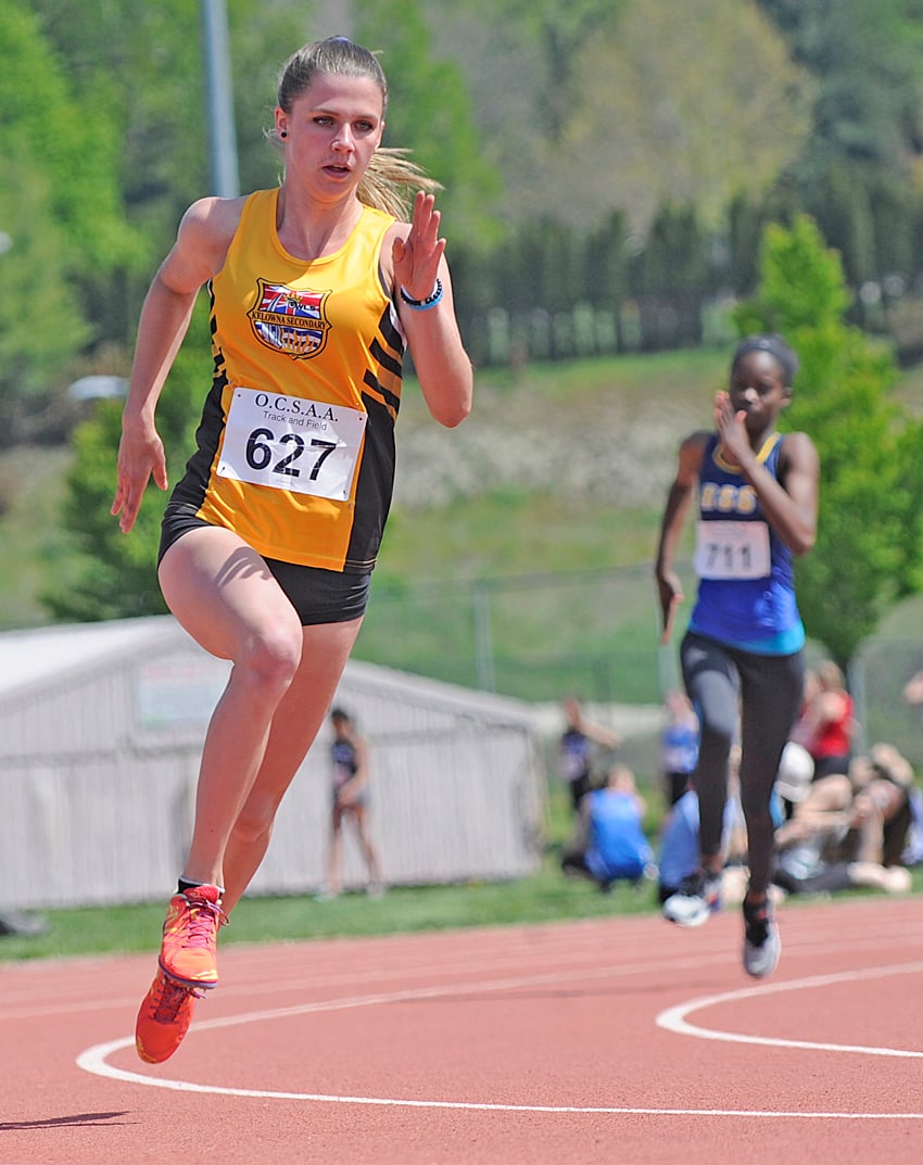 <who>Photo Credit: Lorne White/KelownaNow </who>Three individual wins and one relay victory for Kelowna Secondary's Bryn Walsh.