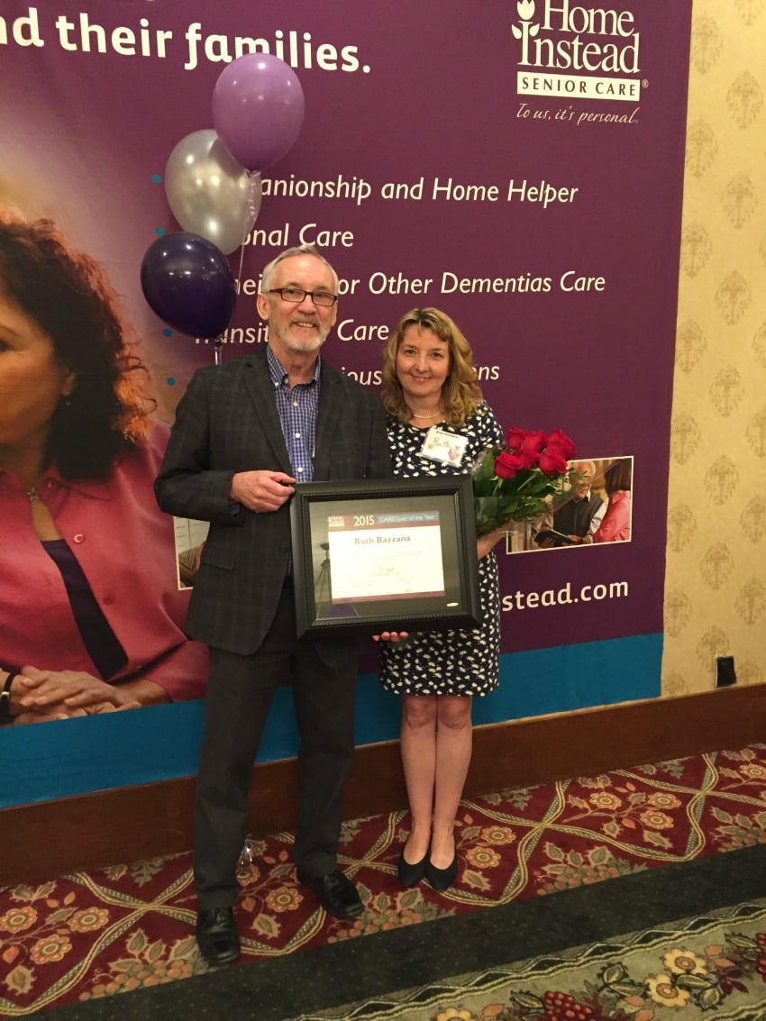 <who> Home Instead Senior Care (l to r): Don Henke, owner, and Ruth Bazzana, Caregiver of the year.