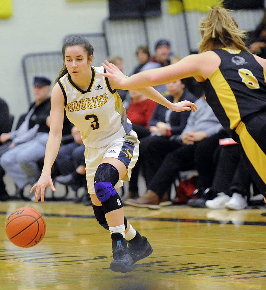<who>Photo Credit: Lorne White/KelownaNow </who>Melaina Corrado's clutch baskets late in the game clinched OKM's wild-card win on Tuesday.