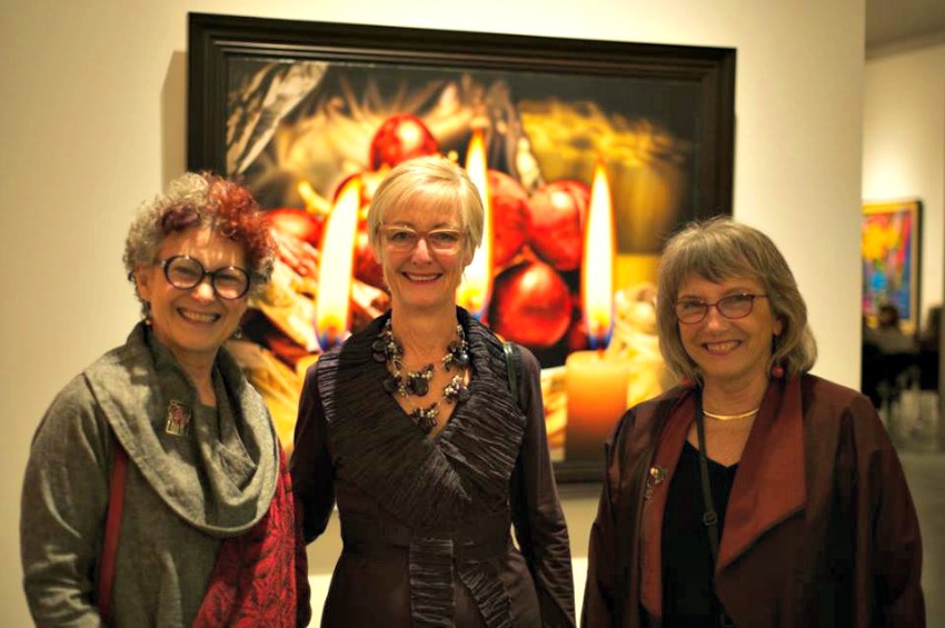 Gallery goers enjoying the unique exhibit.