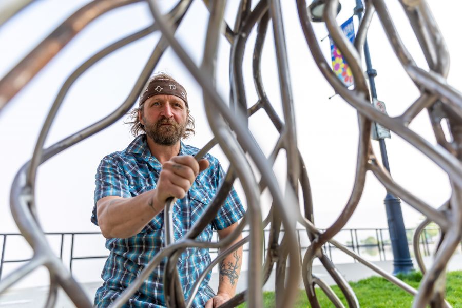 <who>Photo Credit: NowMedia/Gord Goble</who> Karl Mattson looks through the root ball