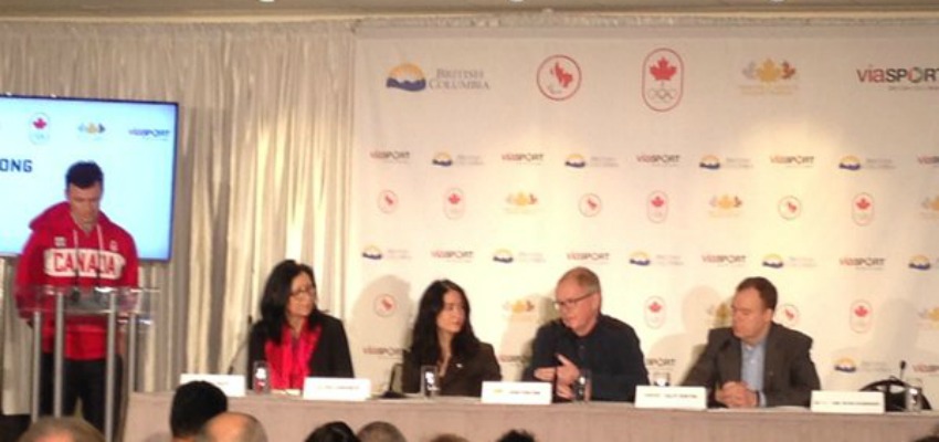<who> Photo Credit: ViaSport/ Facebook </who> Tricia Smith, Gail Hamamoto, John Furlong, and Caley Denton come together to sign a landmark agreement to encourage and support sport in B.C. 