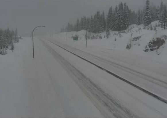 <who> DriveBC </who> HWY 5 (Coquihalla), 61 km south of Merritt, looking south.