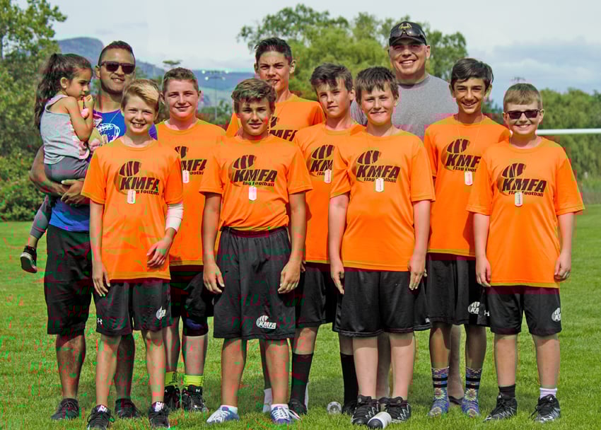 <who>Photo Credit: Contributed </who>A 40-27 victory over the Chargers in the final earned the Kelowna Bengals the KMFA's U14 flag championship on Sunday. Members of the teams are, from left: (head coach), Tor Broughton, Everett Schmuland, Jack Nyrose, Evan Fitchett, Allan Burnell, Matthew Ohlmann, Trent Schmuland (assistant coach), Jackson Saini and Connor Gartner.
