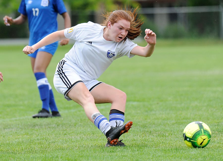 <who>Photo Credit: Lorne White/KelownaNow </who>Kiera Howaniec of Kamloops follows through on a shot that put TOFC into a 2-1 lead in the first half.