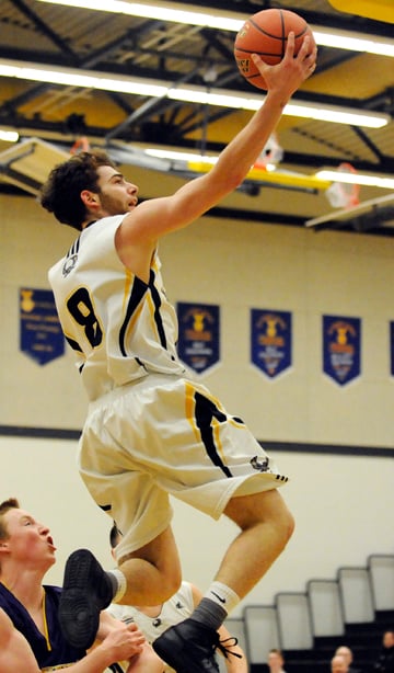 <who>Photo Credit: Lorne White/KelownaNow </who>Davide Ciancio's 22 points led KSS in the tourney final.