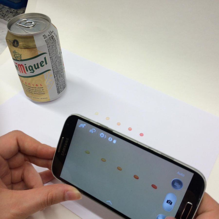 <who> Photo Credit: UCM <who> The sensors change from yellow to pink when they come into contact with a beer containing furfural.