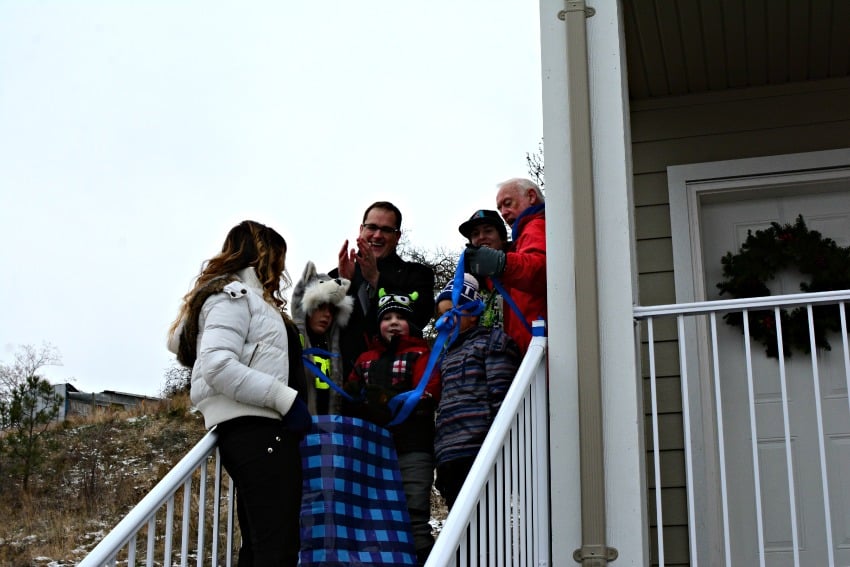 <who> Photo Credit: KelownaNow.com </who> Melanie and her family will be the first to move into their new home.