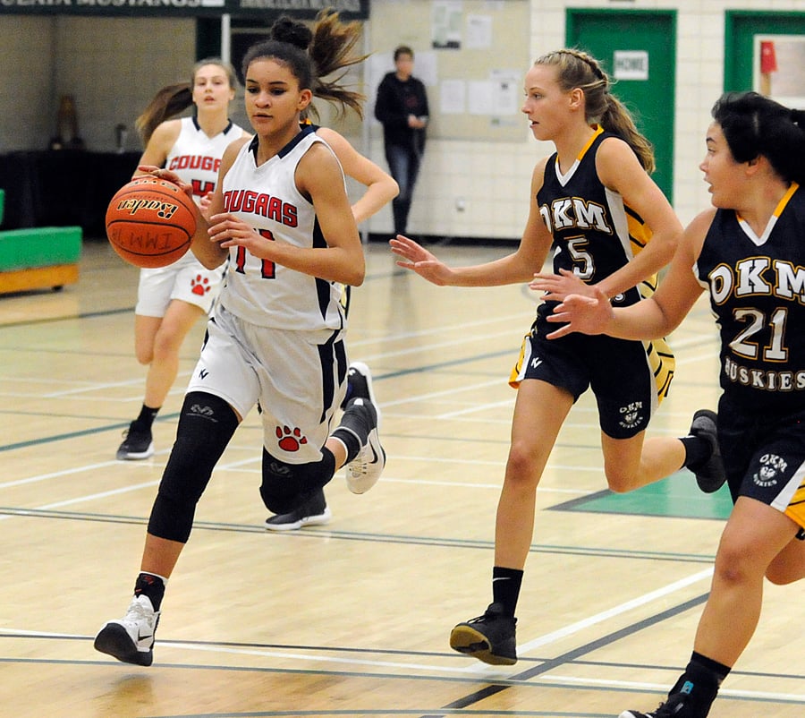 <who>Photo Credit: Lorne White/KelownaNow </who>Mekkila Brown scored 10 points and grabbed 10 rebounds in the KLO Cougars' bronze-medal win over W.L. Seaton of Vernon.