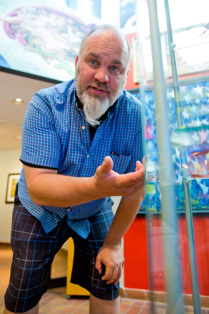 <who>Photo Credit: NowMedia</who> Paul Crawford at one of the Gallery's burgled display cases