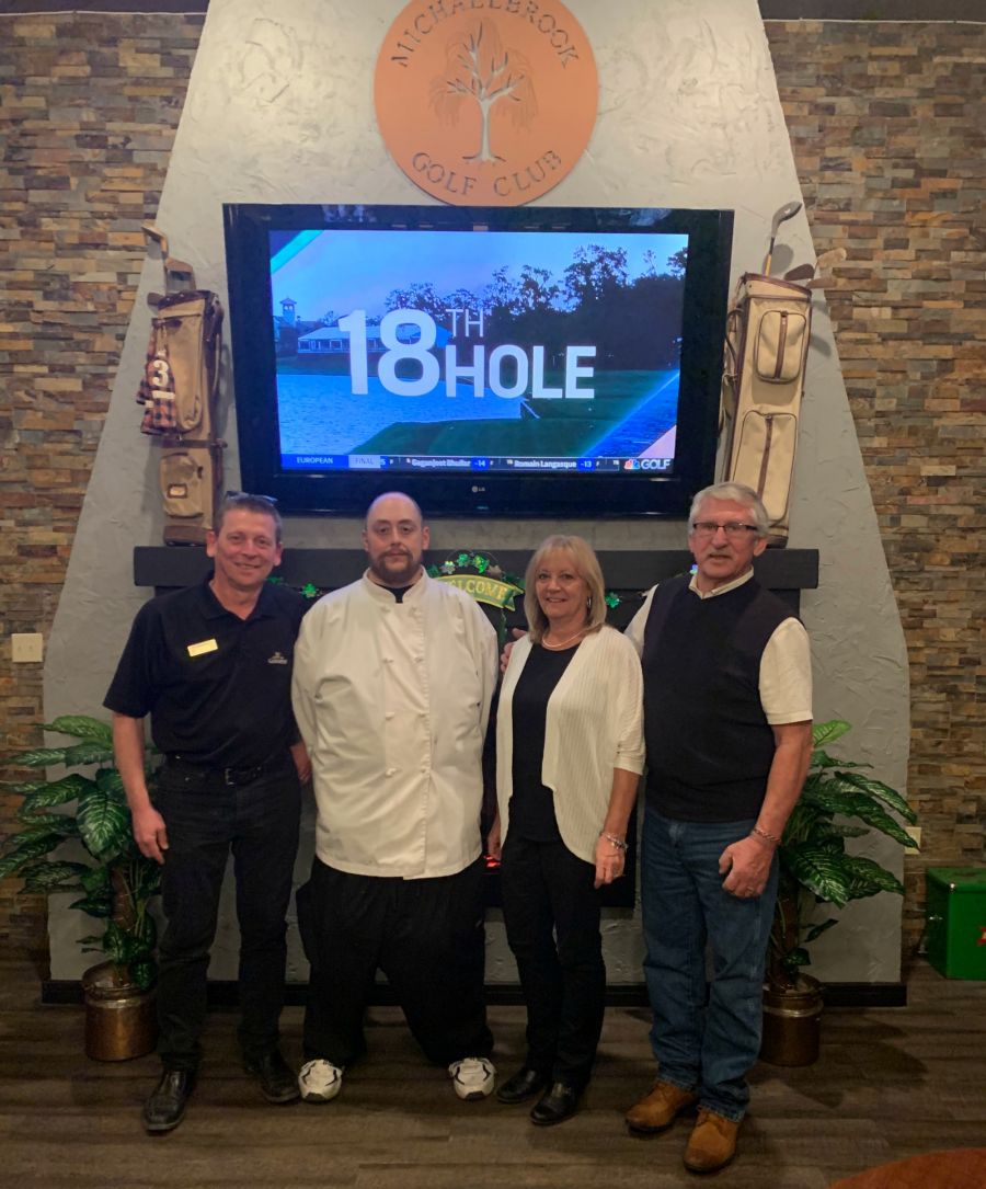 <who>Photo Credit: Contributed</who>Brook Bar and Grill at Michaelbrook Golf Club (L to R) GM Andrew Neville, Chef Sandy Spencer, Betty Dewar and owner Tom Stanbrook.