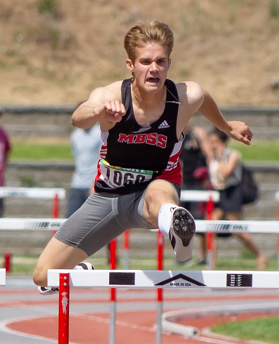 <who>Photo Credit: Vid Wadhwani Photography</who>Mt. Boucherie's Noah Russell displays his gold-medal form in the 400-metre hurdles.
