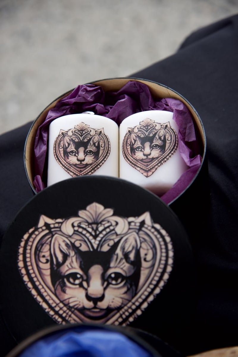 A Set of awesome candles designed by the business Questionable Taste