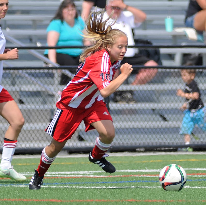 <who>Photo Credit: Lorne White/KelownaNow </who>Emily Metz of United U15 makes a quick transition to offence after intercepting a U16 pass on defence.