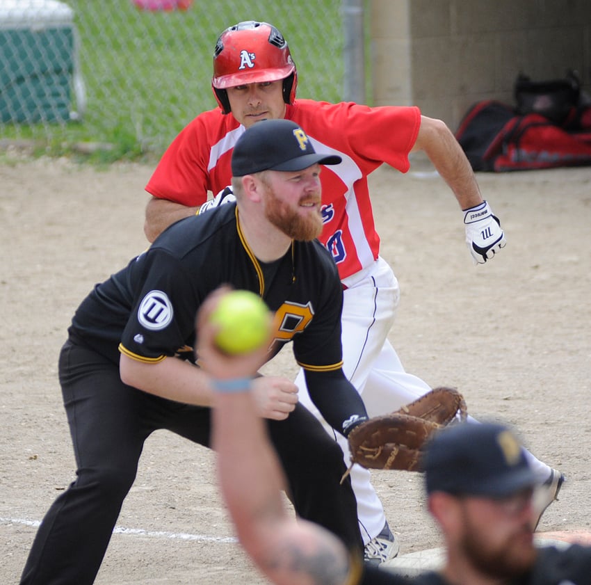 <who>Photo Credit: Lorne White/KelownaNow </who>Kelowna All-Stars' Kyle Blanleil begins his steal of second base in a round-robin matchup with Grande Prairie.