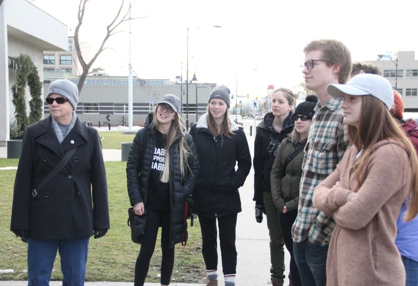 <who> Photo Credit: KelownaNow </who> March On, a coast-to-coast women's march took place in Kelowna on Saturday.