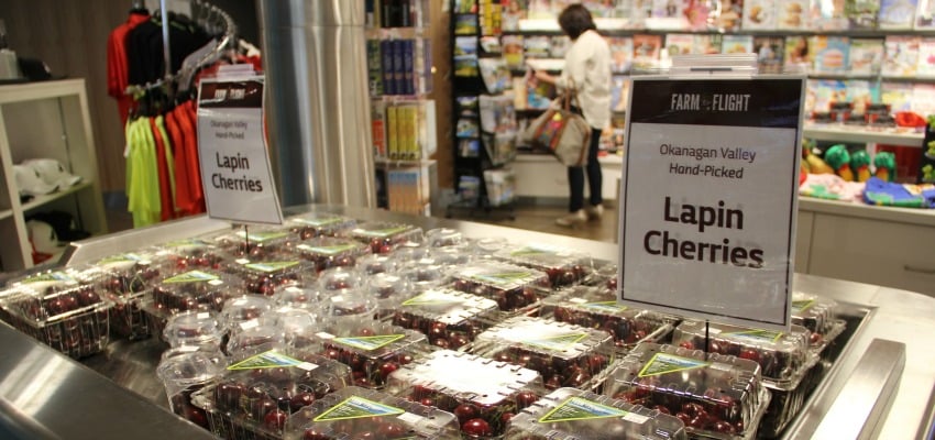 <who> Photo Credit: KelownaNow. </who> Fruit is now being sold at the airport for travelers from within Canada to take home. 