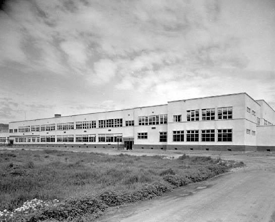 <who>Photo Credit: Old Kelowna/BC Archives</who>The site of Central Green was previously the home of Kelowna High School, now known as Kelowna Secondary School. (Circa 1952)