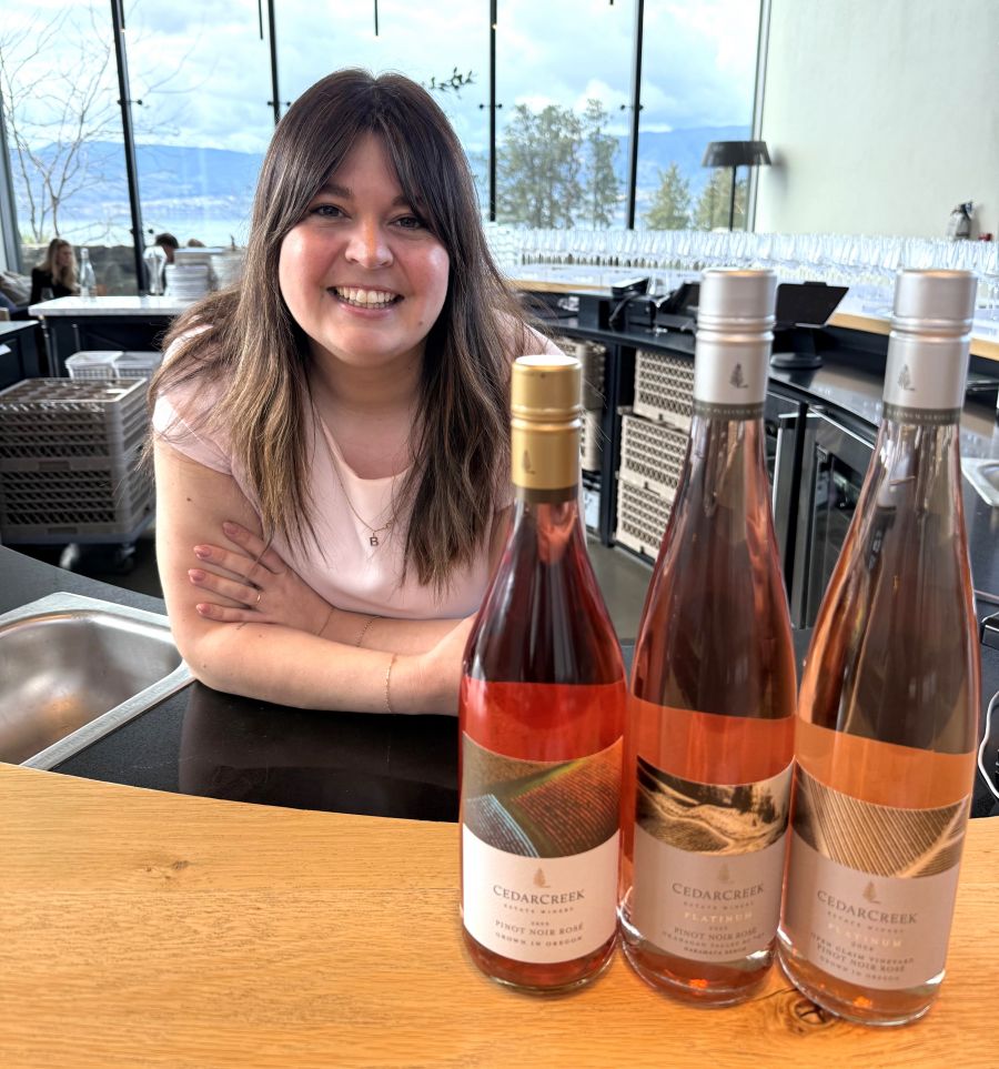 </who>CedarCreek guest experience manager Brynne Dickson with three of the winery's roses.