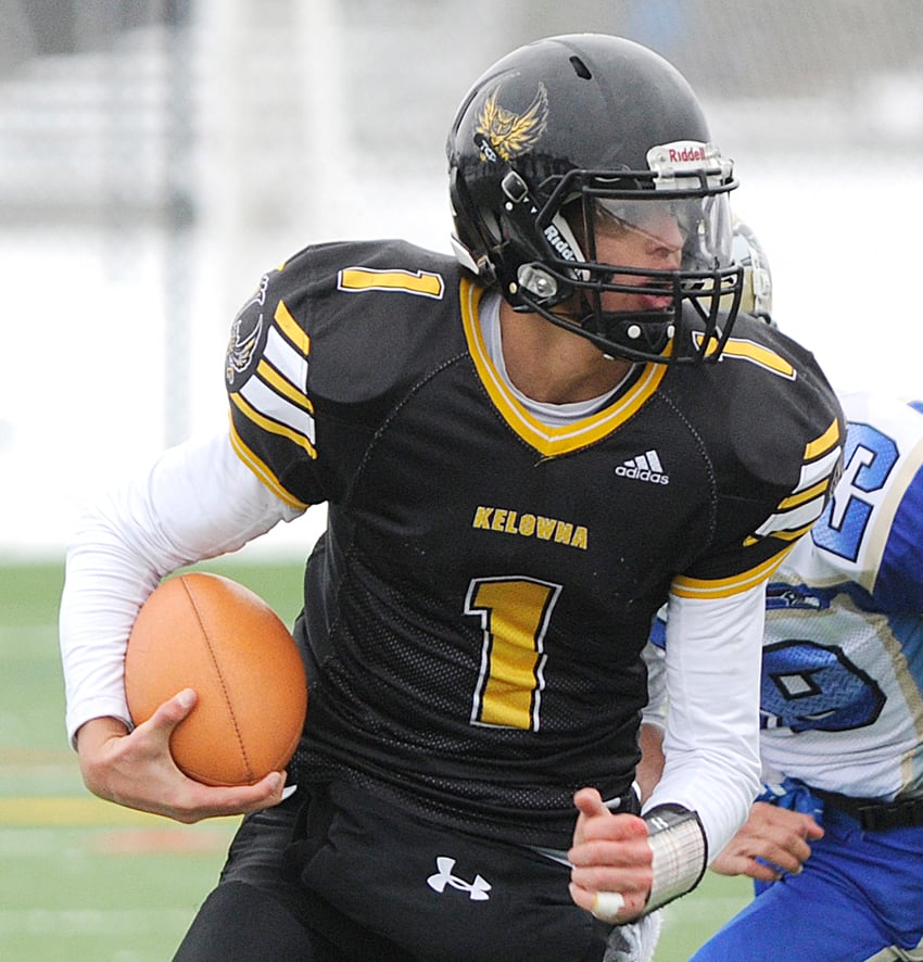 <who>Photo Credit: Lorne White/KelownaNow </who>Isaac Athans ran for a pair of touchdowns in the senior Owls' victory over Salmon Arm.