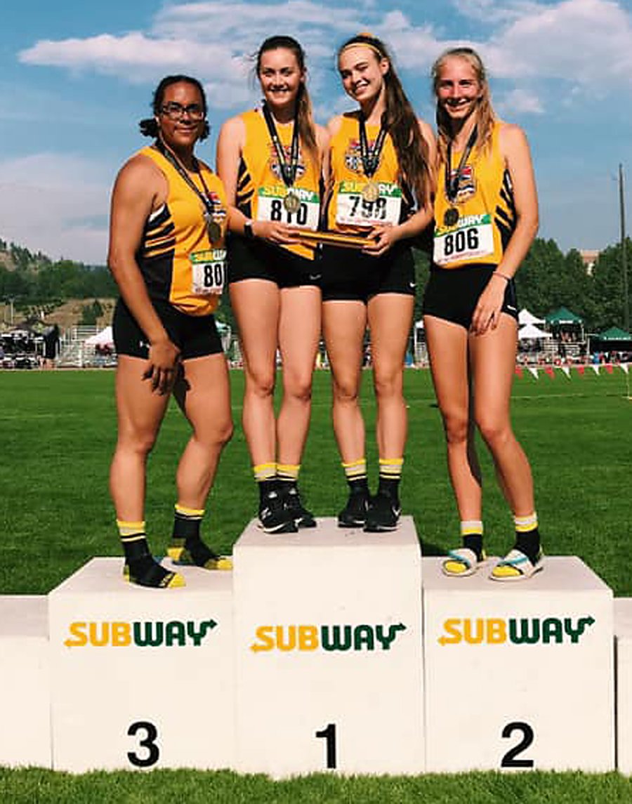 <who>Photo Credit: Contributed </who>The KSS team of, from left, Kenaysha Lyder, Lindsay Maier, Emma Cannan and Madelyn Hettinga earned top spot on the podium after their provincial 4x100 relay win at the Apple Bowl.