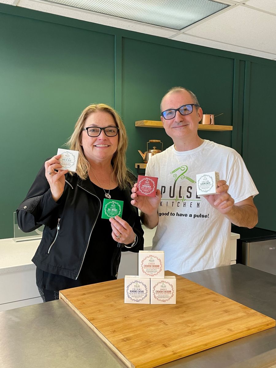 </who>Boosh Plant-Based Brands founder and president Connie Marples and Pulse Kitchen founder Stephanos Liapis celebrate the merger of the companies with, what else?, vegan cheeses.