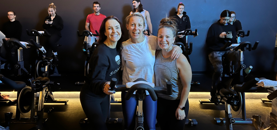 <who> Photo Credit: Contributed </who> Webber (middle) during one of her five spin classes on the day.