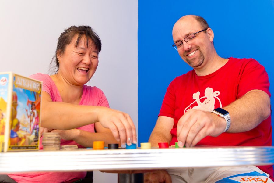 <who>Photo Credit: NowMedia</who> Cheryl and Jim Roepcke of Meeples and MIlkshakes