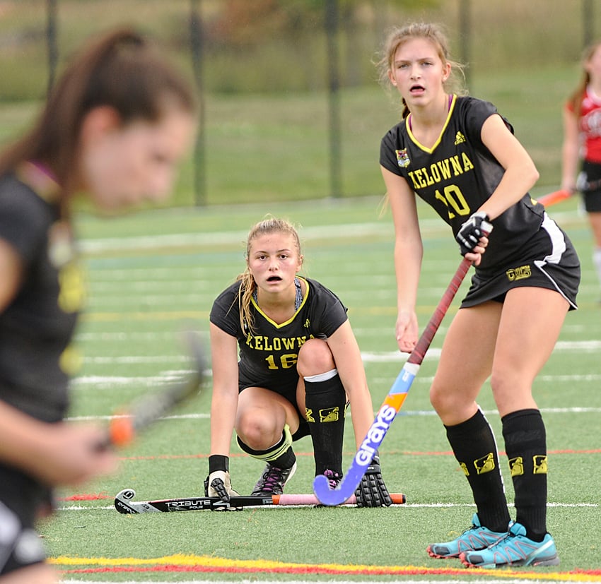 <who>Photo Credit: Lorne White/KelownaNow </who>Natalie Hope, left, and Zoe Bown get set for a short corner in a regular-season match with Mt. Boucherie.