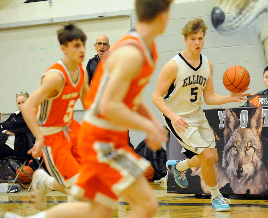 <who>Photo Credit: Lorne White/KelownaNow </who>Triston Hearn of the GESS Coyotes scored 18 points and pulled down 18 rebounds in the tournament final.