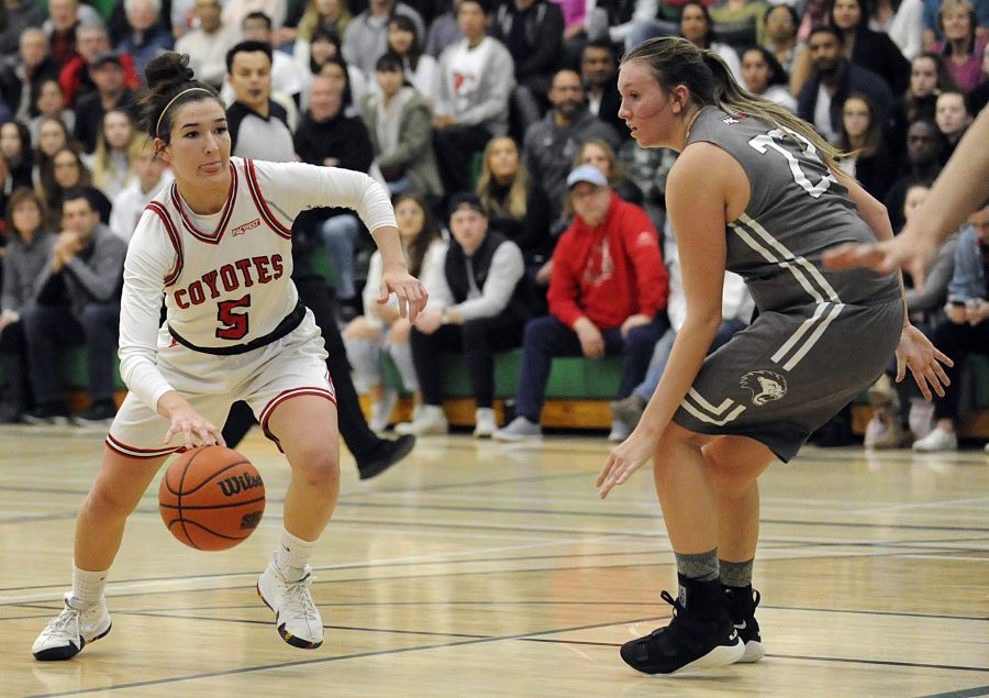 <who>Photo Credit: Lorne White/KelownaNow </who>Danielle Ruocco of the Coyotes contributed eight points in a losing cause against visiting Douglas College. 