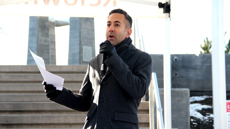 <who> Photo Credit: KelownaNow. </who> Mayor Colin Basran made the announcement in Stuart Park on Wednesday. 
