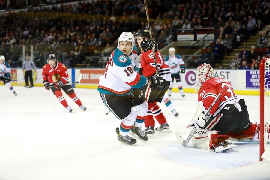 <who>Photo Credit: KelownaNow </who>Carson Twarynski with the assist on Lind's game winner.