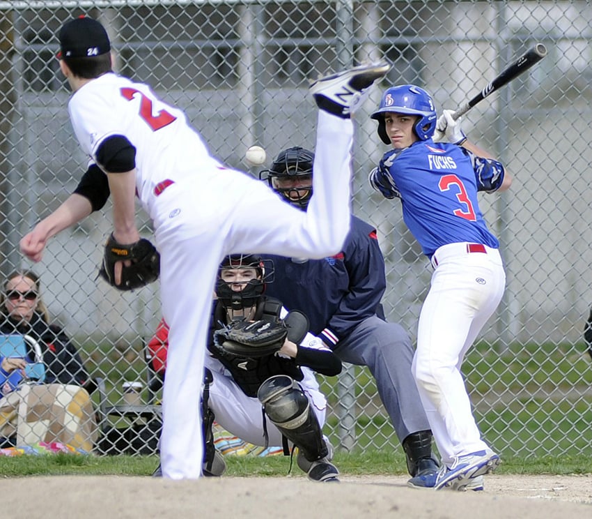 <who>Photo Credit: Lorne White/KelownaNow </who>Matt Fuchs of the Kelowna Sun Devils eyes a pitch from a Cloverdale Spurs pitcher in the season opener at Edith Gay Park.