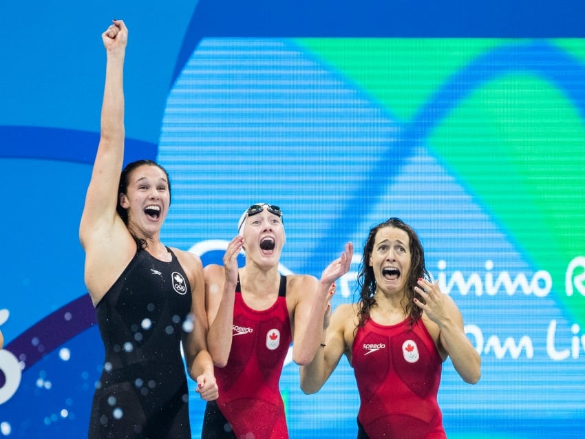 <who> Photo Credit: Canadian Olympic Committee, Mark Blinch. </who> From L to R: Chantal Van Landeghem, Taylor Ruck and Sandrine Mainville.