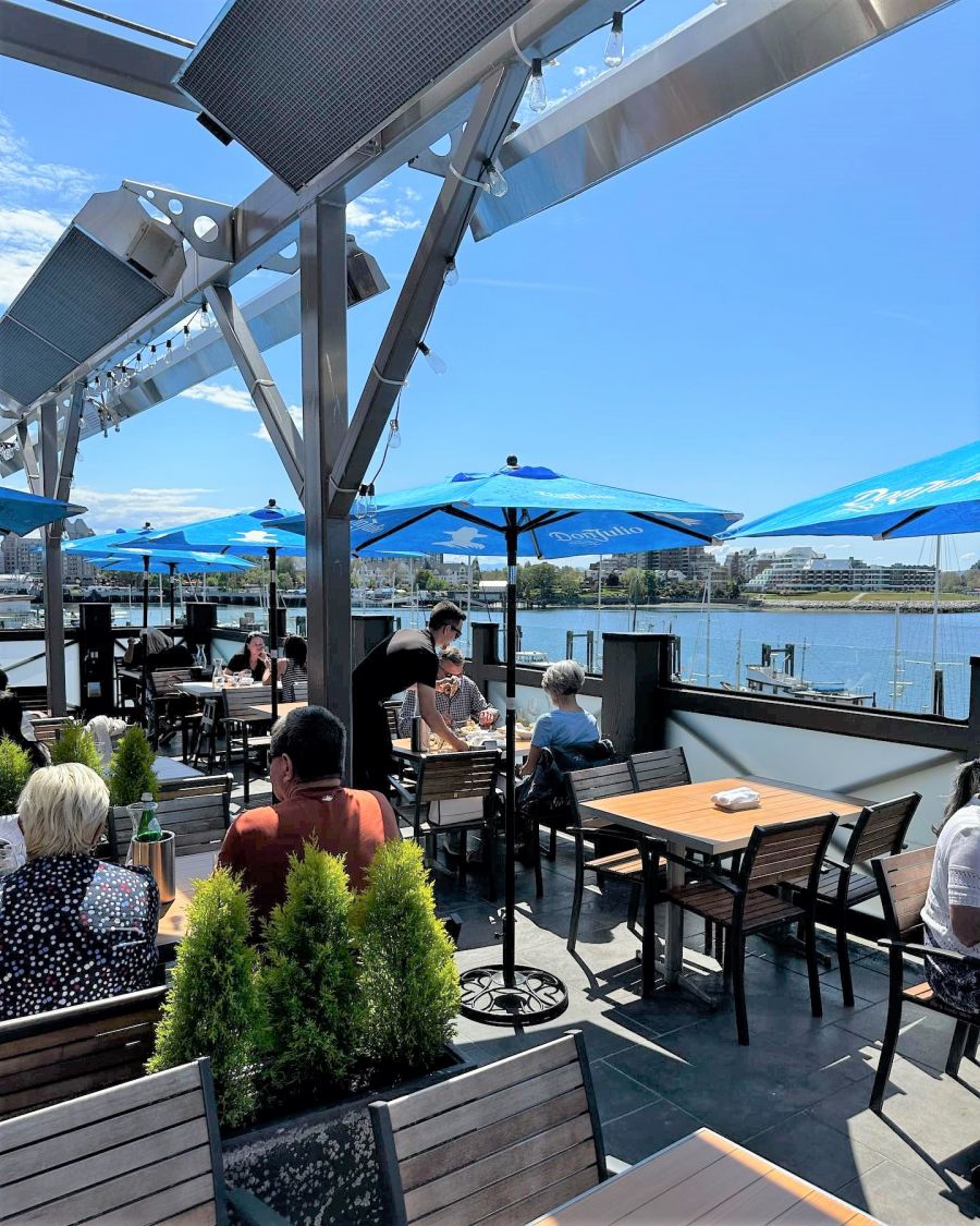 </who> Finn's deck has a prime view over the Inner Harbour. Below, an order of Finn's fish and chips.