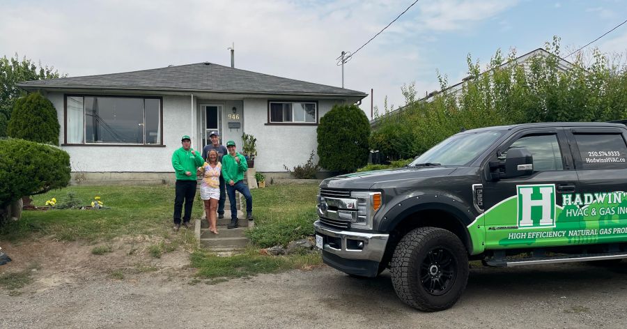 <who>Photo Credit: Contributed</who>Madison Fujita and Brian Hadwin from Hadwin's HVAC & Gas Inc. meet with Angela Bigg and Rod Heibein at their home.