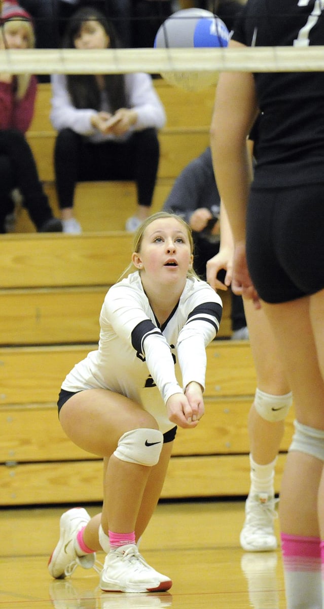 <who>Photo Credit: Lorne White/KelownaNow </who>Defence will be a key to success and Thea Ley, a Grade 11 libero, is up to the task.