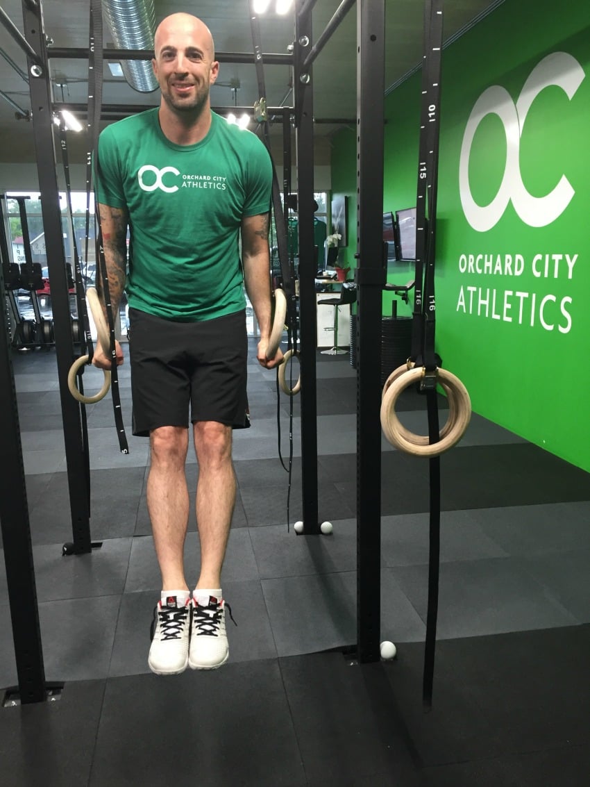 <who> Dan Drynan, owner of Orchard City Athletics 